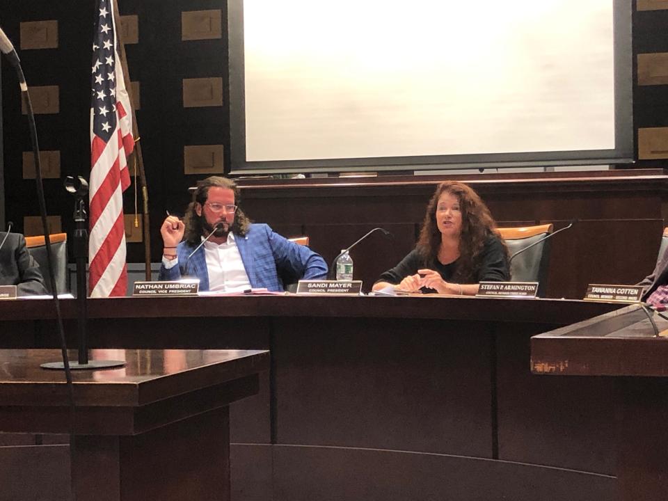 Morristown Council President Sandi Mayer, right, speaks out against preliminary expansion plans for Morristown Medical Center while Council Vice President Nathan Umbriac looks on at the Town Council meeting Tuesday, Sept. 26, 2023.