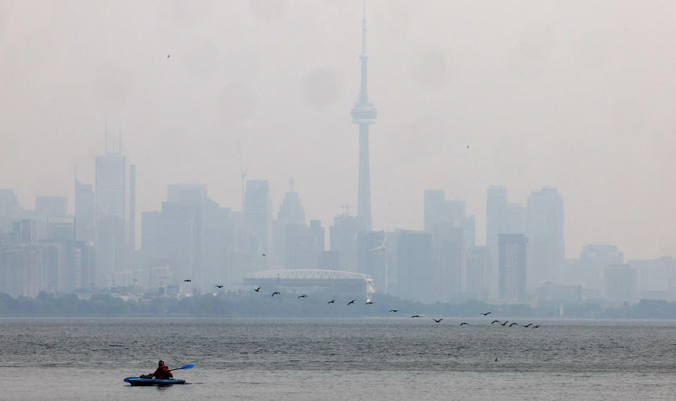 TORONTO, ON - JUNE 6  -  as the Smoke from forest fires out west and 48 active fires in Northern Ontario contribute to a hazy view of the skyline from Humber Bay Park West over Toronto. June 6, 2023.        (Steve Russell/Toronto Star via Getty Images)