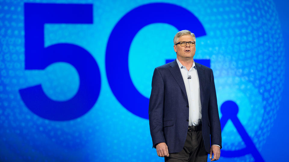 Steve Mollenkopf speaking on stage in front of "5G"