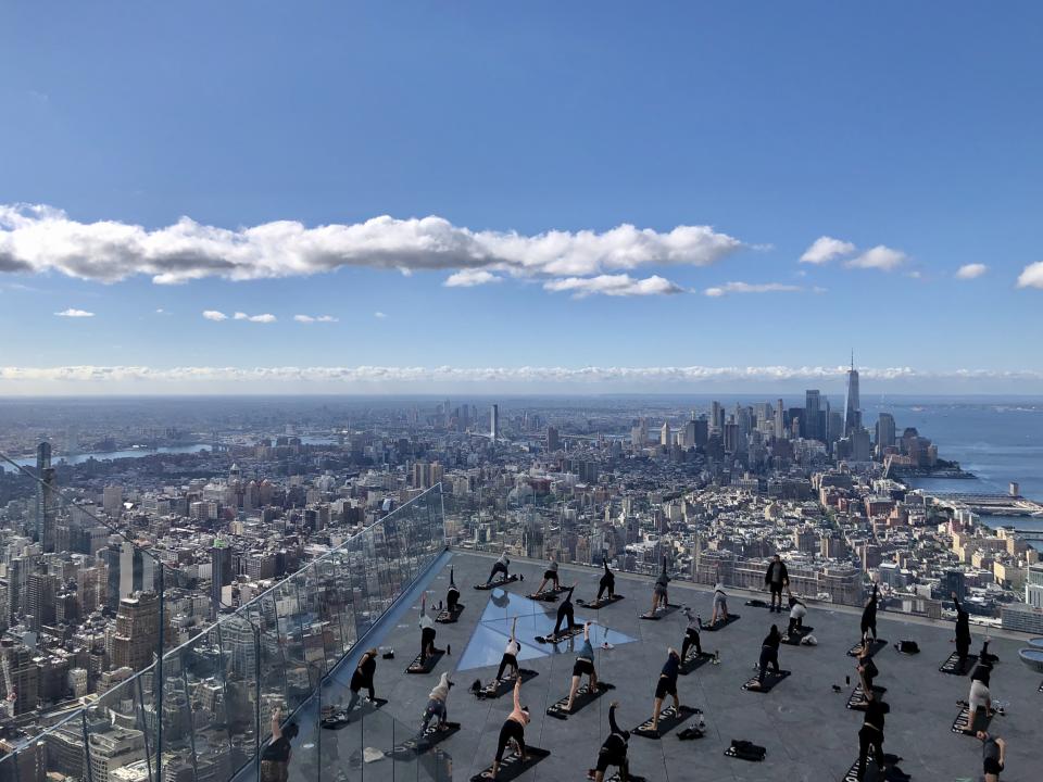 Each class allows a few dozen people to do yoga while 1,100 feet above Manhattan’s Hudson Yards. - Credit: Courtesy Photo
