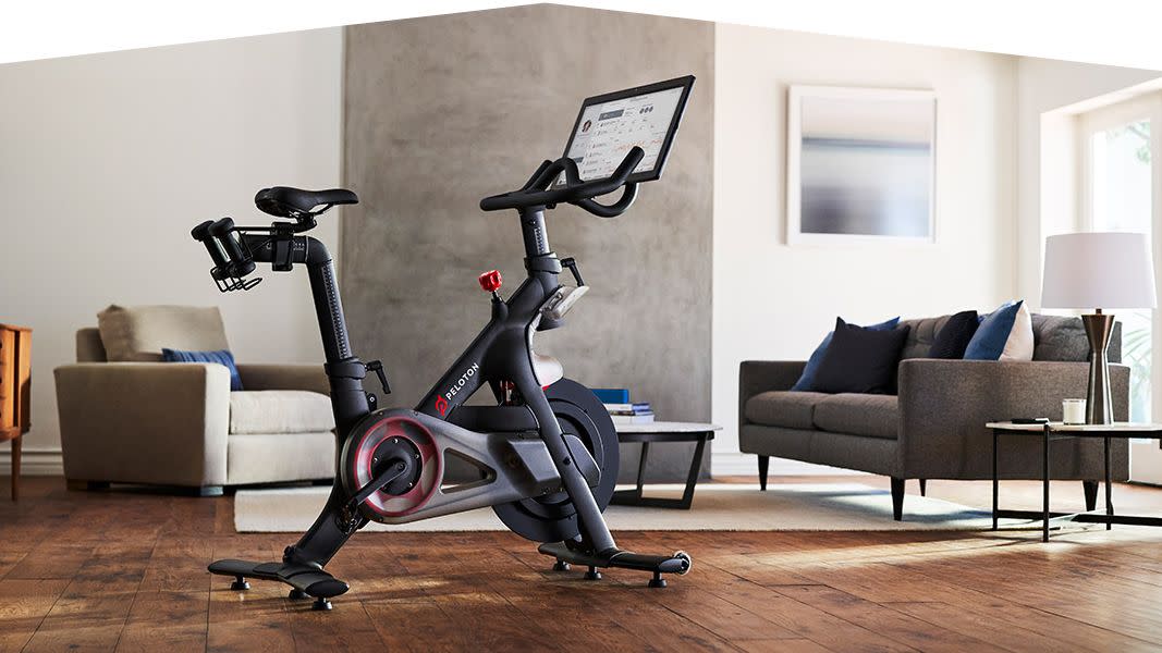 exercise machine, exercise equipment, stationary bicycle, indoor cycling, room, elliptical trainer, sports equipment, furniture, exercise, vehicle,