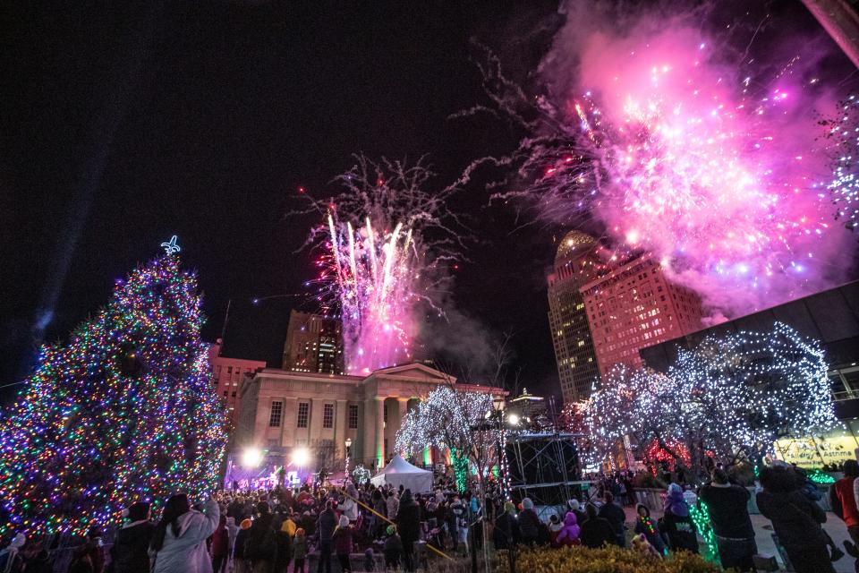 Fireworks explode as the trees in Jefferson Square are lit up during Light Up Louisville. Nov 26, 2021