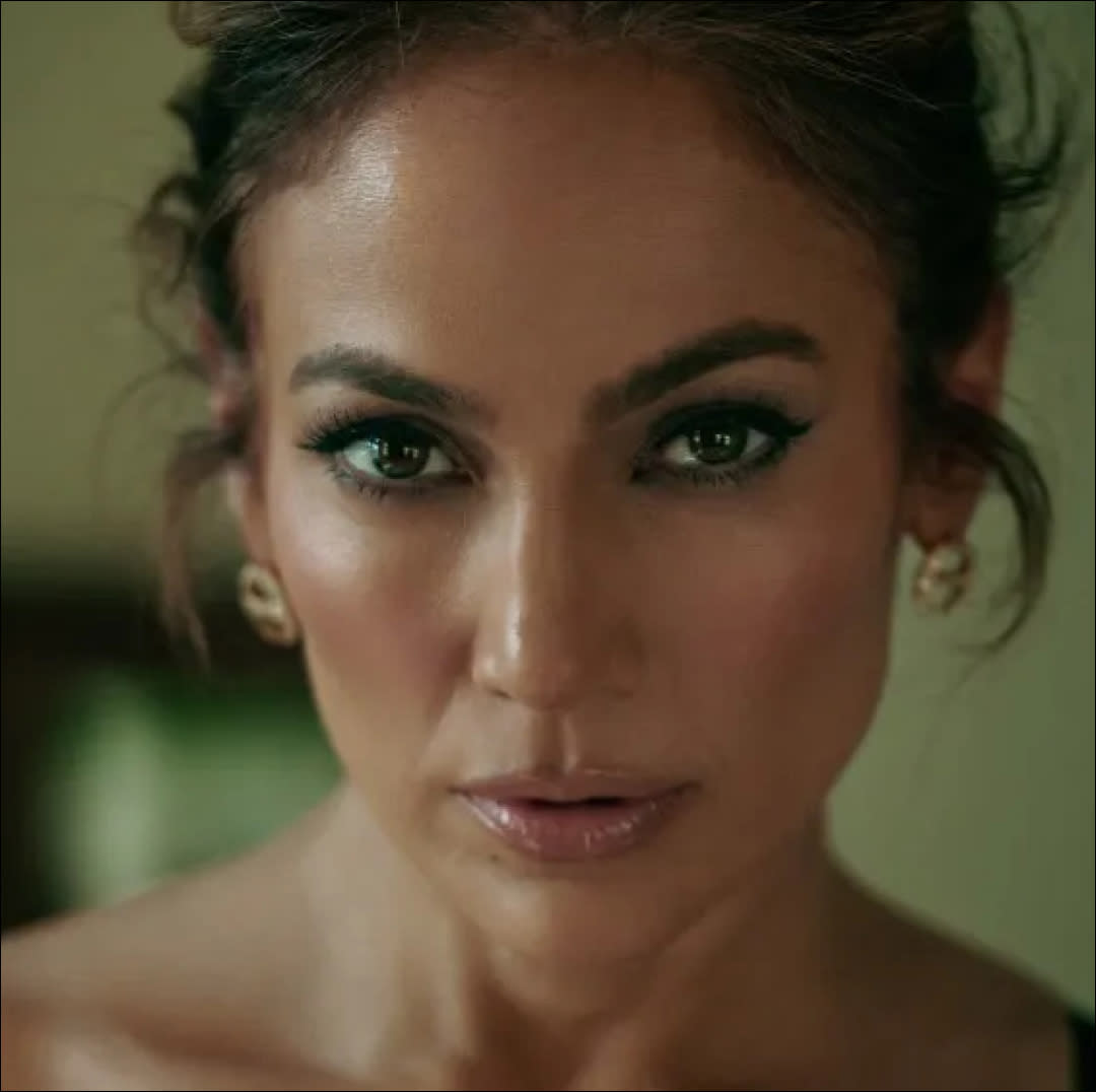  Screenshot of jennifer lopez in this is me now film teaser. 