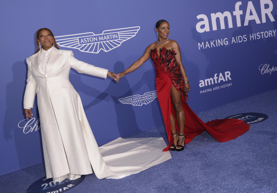 Queen Latifah, left and Eboni Nichols pose for photographers upon arrival at the amfAR Cinema Against AIDS benefit at the Hotel du Cap-Eden-Roc, during the 76th Cannes international film festival, Cap d'Antibes, southern France, Thursday, May 25, 2023. (Photo by Vianney Le Caer/Invision/AP)