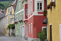 <p>Muted shades of red, green, and yellow bring life to the rolling hills of Austria.</p>