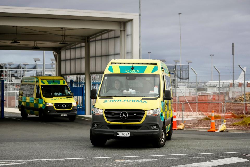 Ambulances leave Auckland International in Auckland, New Zealand, Monday, March 11, 2024. About 50 people were injured after what officials described as a "technical event" on a Chilean plane traveling from Sydney, Australia, to Auckland. (Dean Purcell/New Zealand Herald via AP)