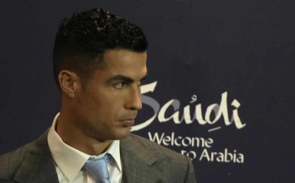 Cristiano Ronaldo arrives for his official unveiling as a new member of Al Nassr soccer club in in Riyadh, Saudi Arabia, Tuesday, Jan. 3, 2023. Ronaldo, who has won five Ballon d'Ors awards for the best soccer player in the world and five Champions League titles, will play outside of Europe for the first time in his storied career. (AP Photo/Amr Nabil)