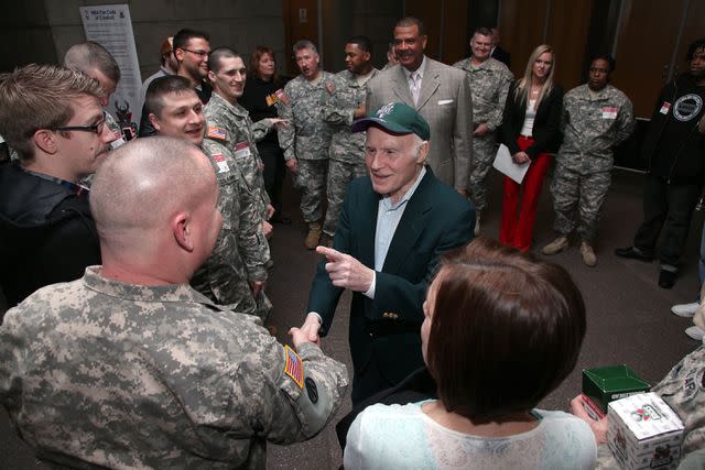 <p>Gary Dineen/NBAE via Getty</p> Herb Kohl greeting Wounded Warriors in 2012