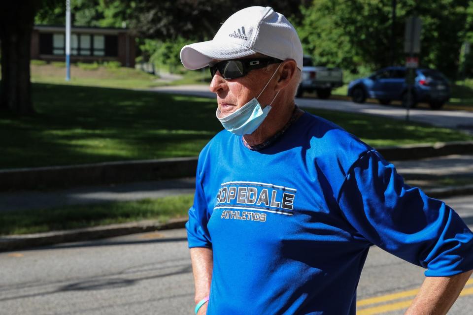 In 2020, Hopedale running coach Joe Drugan looked down the street at Hopedale Memorial Elementary School. The longtime Hopedale High coach ran in a 5K  to honor people over 70 who had suffered or lost their lives during the coronavirus pandemic.