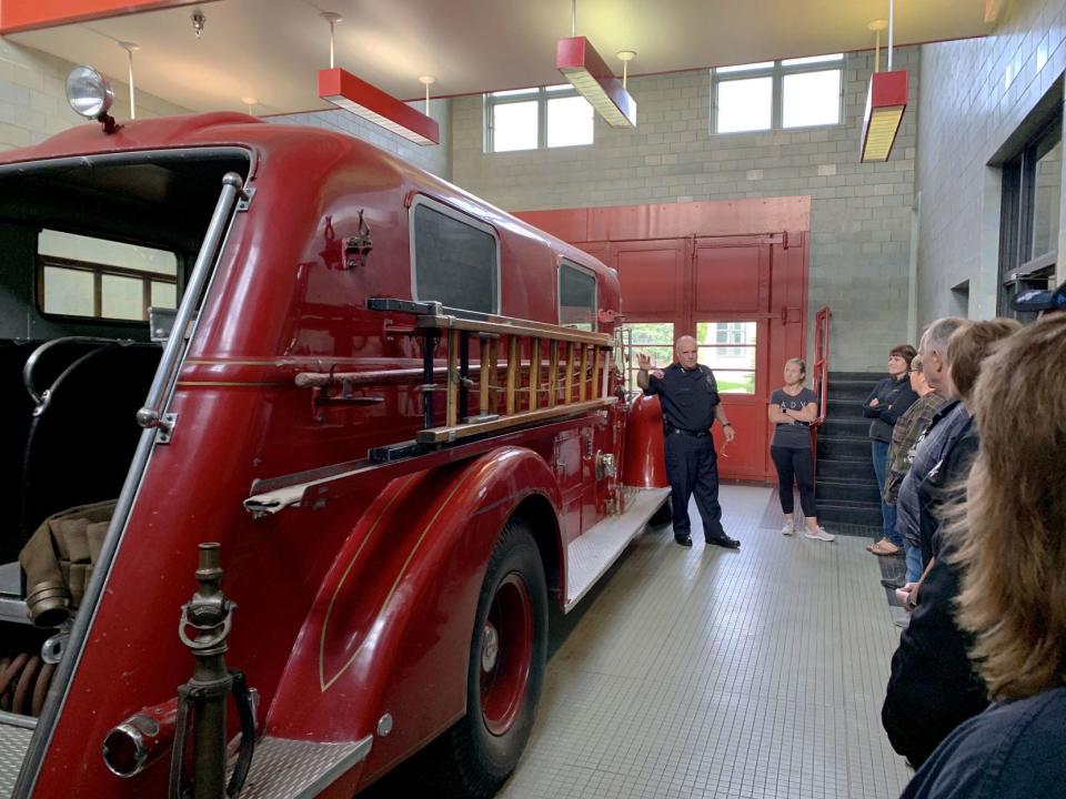 Petoskey Department of Public Safety Director Matt Breed shows one of Petoskey’s original fire engines to a Citizens Academy class.