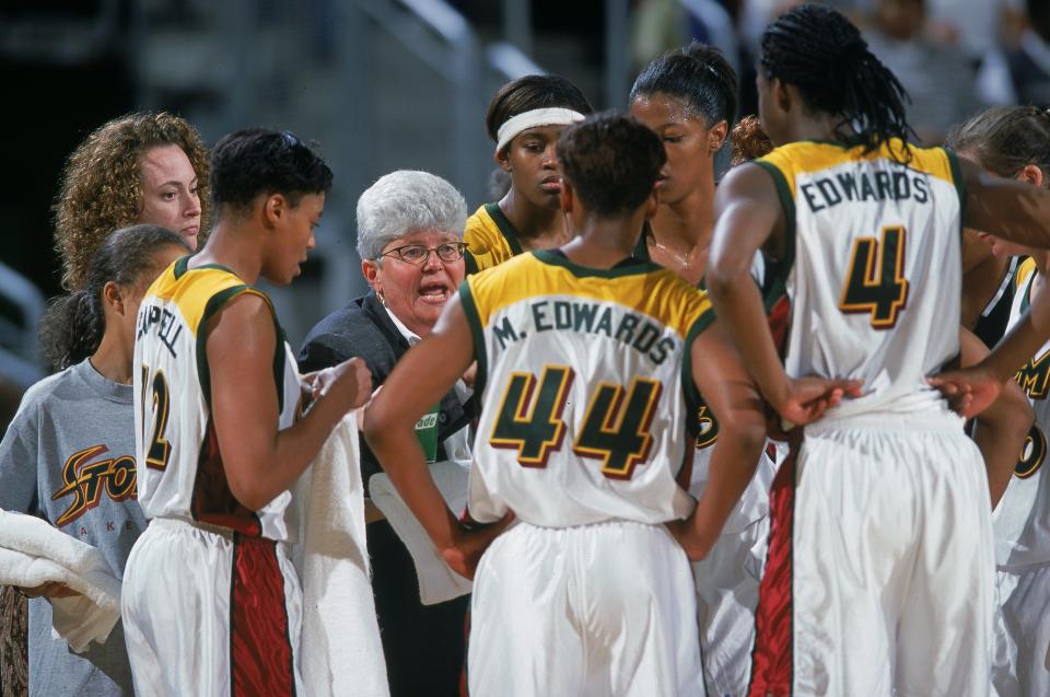 Lin Dunn talks to Seattle Storm players during a 2000 game against the Utah Starzz at Key Arena in Seattle. (Otto Greule Jr./Allsport)