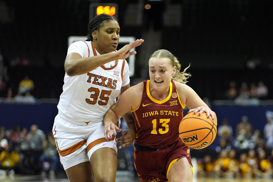 Iowa State guard Hannah Belanger (13) drives under pressure from Texas forward Madison Booker (35) during the first half of an NCAA college basketball game for the Big 12 tournament championship Tuesday, March 12, 2024, in Kansas City, Mo. (AP Photo/Charlie Riedel)