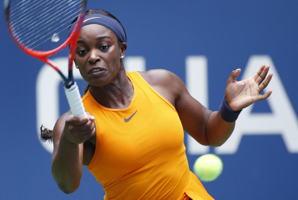 Sloane Stephens returns a shot to Victoria Azarenka, of Belarus, during the third round of the U.S. Open tennis tournament, Friday, Aug. 31, 2018, in New York. (AP Photo/Jason DeCrow)