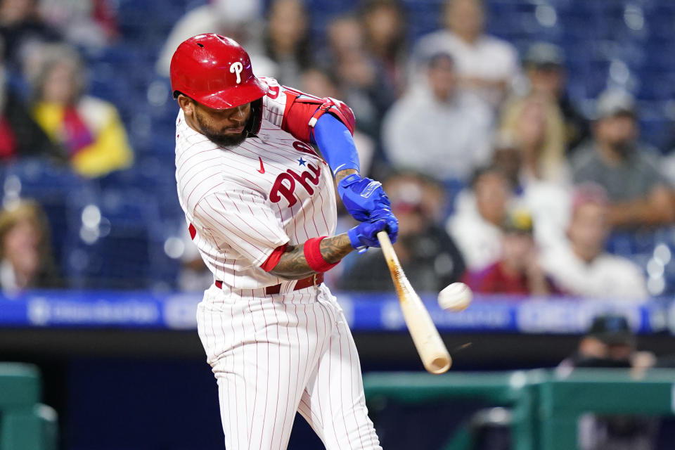 Philadelphia Phillies' Edmundo Sosa hits a two-run home run against Miami Marlins pitcher Trevor Rogers during the third inning of a baseball game, Wednesday, Sept. 7, 2022, in Philadelphia. (AP Photo/Matt Slocum)