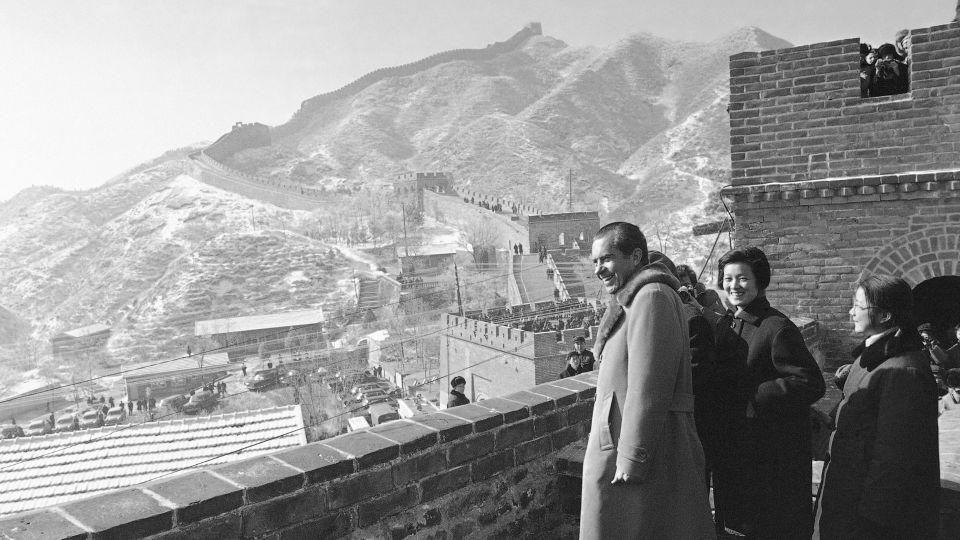 Nixon stands on the Great Wall of China on the outskirts of Beijing. - AP