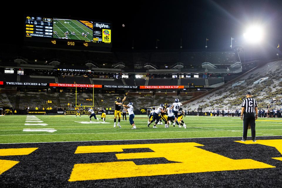 Nevada's Matt Freem punts the ball during a NCAA football game against Iowa, Sunday, Sept. 18, 2022, at Kinnick Stadium in Iowa City, Iowa.