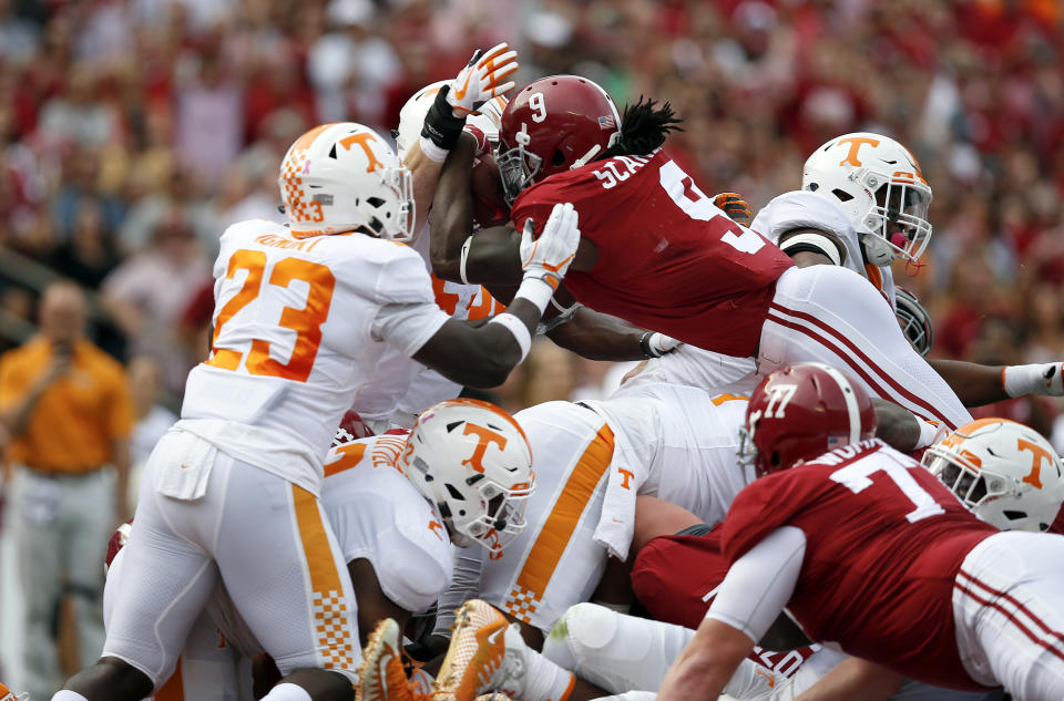 Alabama running back Bo Scarbrough leaps into the end zone to score a touchdown during the first half an NCAA college football game against Tennessee, Saturday, Oct. 21, 2017, in Tuscaloosa, Ala. (AP Photo/Brynn Anderson)