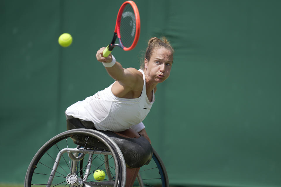 Jiske Griffioen of the Netherlands in action against Diede De Groot of the Netherlands during the women's wheelchair singles final match on day thirteen of the Wimbledon tennis championships in London, Saturday, July 15, 2023. (AP Photo/Kin Cheung)