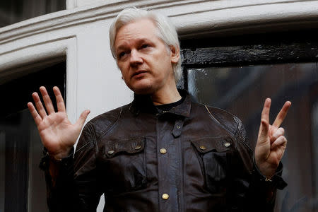 FILE PHOTO: WikiLeaks founder Julian Assange is seen on the balcony of the Ecuadorian Embassy in London, Britain, May 19, 2017. REUTERS/Peter Nicholls/File photo