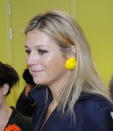 Photo by: Getty Images<br> She has fun with accessories: When attending the opening of a domestic violence women's shelter in Alkmaar, Maxima celebrated the occasion with bright yellow oversized earrings that popped.