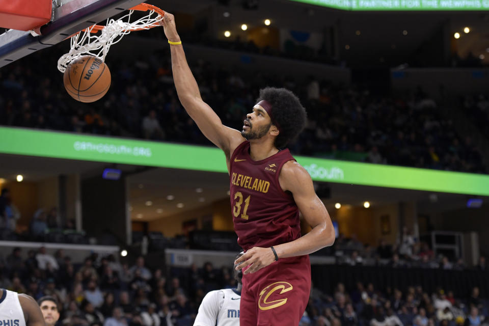 Cleveland Cavaliers center Jarrett Allen (31) dunks in the second half of an NBA basketball game against the Memphis Grizzlies, Thursday, Feb. 1, 2024, in Memphis, Tenn. (AP Photo/Brandon Dill)