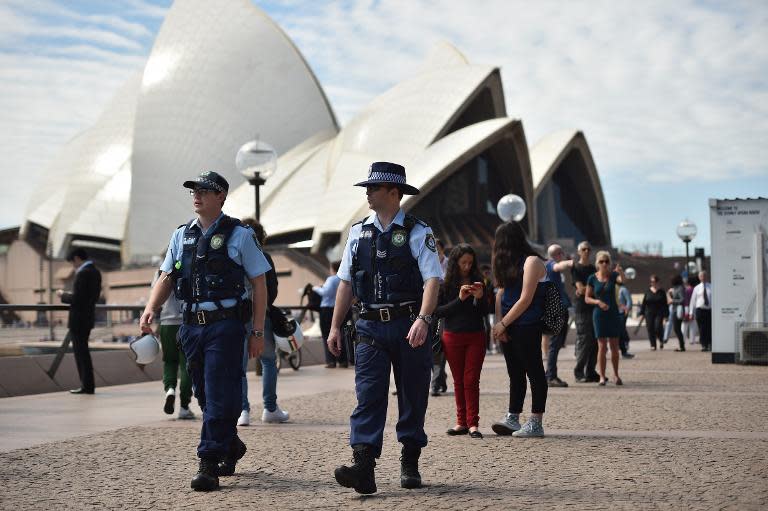 Police patrol in front of the Sydney Opera House, on September 24, 2014