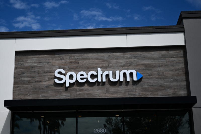 The Spectrum logo is displayed outside one of the cable TV, phone, and internet company’s stores in Manhattan Beach, California. - Image: Patrick T. Fallon (Getty Images)