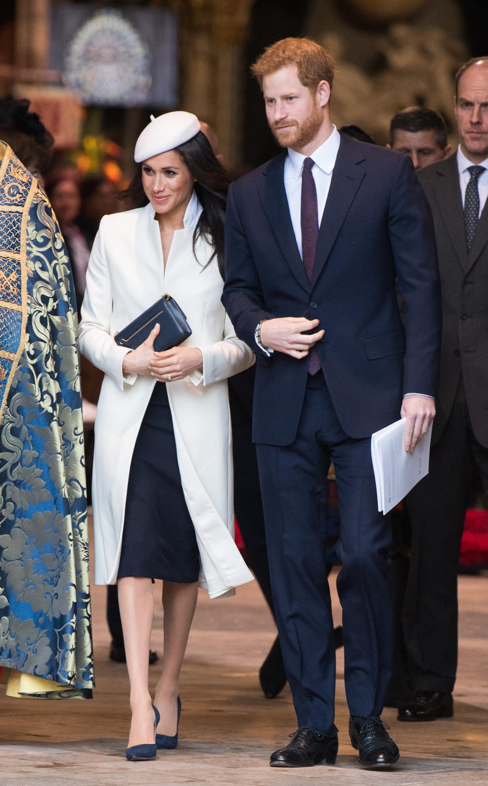Prince Harry wore a navy suit for the occasion, as did Prince William. (Photo: Samir Hussein via Getty Images)