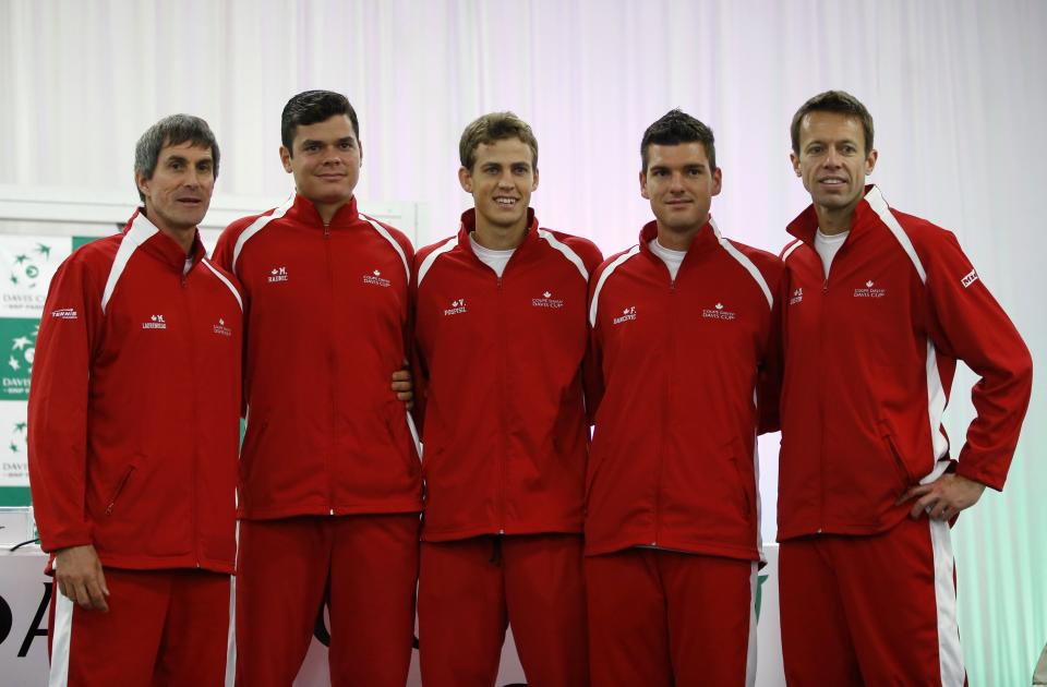 From L-R: Canada's tennis team, coach Martin Laurendeau, Milos Raonic, Vasek Pospisil, Frank Dancevic and Daniel Nestor pose for a picture after the draw for the Davis Cup semi-finals in Belgrade September 12, 2013. Canada will face Serbia in the Davis Cup semi-final match on Friday. REUTERS/Marko Djurica (SERBIA - Tags: SPORT TENNIS)