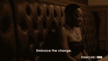 Person on sofa with subtitle "Embrace the change" from HBO's Insecure