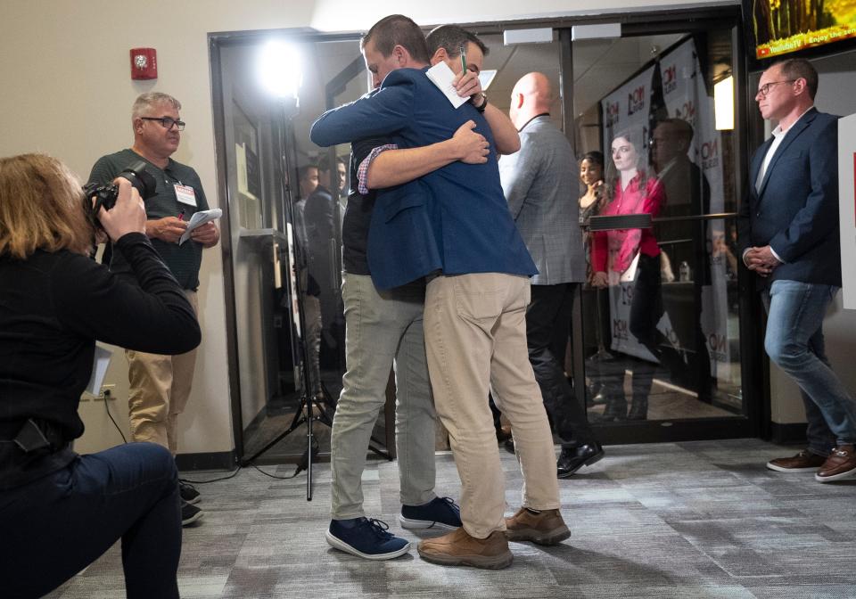 Aaron Baer, President of Center for Christian Virtue, hugs Peter Range, Executive Director of Ohio Right to Life following the announcement of the results of their loss on Issue One at the gathering hosted by Protect Women Ohio at the Center for Christian Virtue in Downtown Columbus, Ohio.