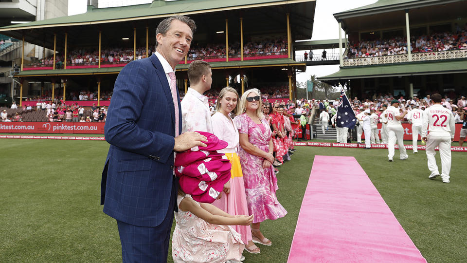 Glenn McGrath, pictured here presenting pink caps on Jane McGrath Day during the third Test between Australia and New Zealand at the SCG in 2020.