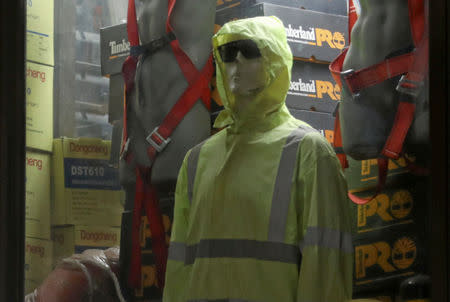 A yellow vest is seen in a display of a shop at downtown in Cairo, Egypt, December 12, 2018. REUTERS/Mohamed Abd El Ghany