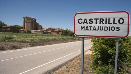 A sign with the name of the village of Castrillo Matajudios (Kill Jews Fort) is seen near its entrance in northern Spain May 16, 2014. REUTERS/Ricardo Ordonez