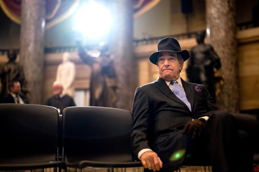 WASHINGTON, DC - DECEMBER 14: Paul Pelosi, husband of Speaker of the House Nancy Pelosi (D-CA), sits, waiting following a portrait unveiling ceremony for the Speaker in National Statuary Hall in the U.S. Capitol Building on Wednesday, Dec. 14, 2022 in Washington, DC. Pelosi's portrait is an oil painting on canvas and painted by Ronald Sherr, who also painted the portrait of former Speaker of the House John Boehner (R-OH). (Kent Nishimura / Los Angeles Times)