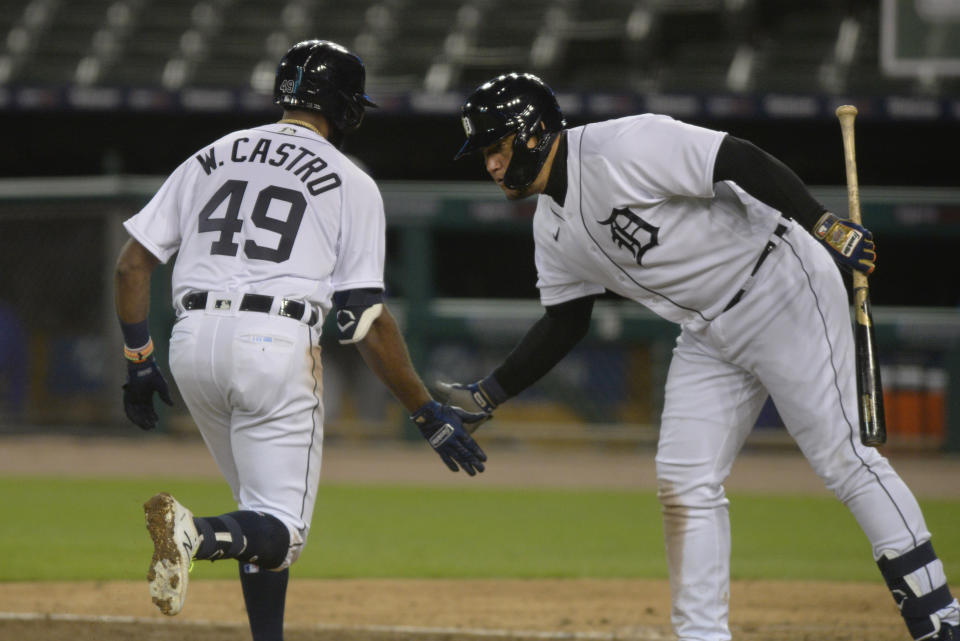 Detroit Tigers' Willi Castro is congratulated by Miguel Cabrera after hitting a home run against the Kansas City Royals during the sixth inning of a baseball game Tuesday, Sept. 15, 2020, in Detroit. The Tigers won 6-0. (AP Photo/Jose Juarez)