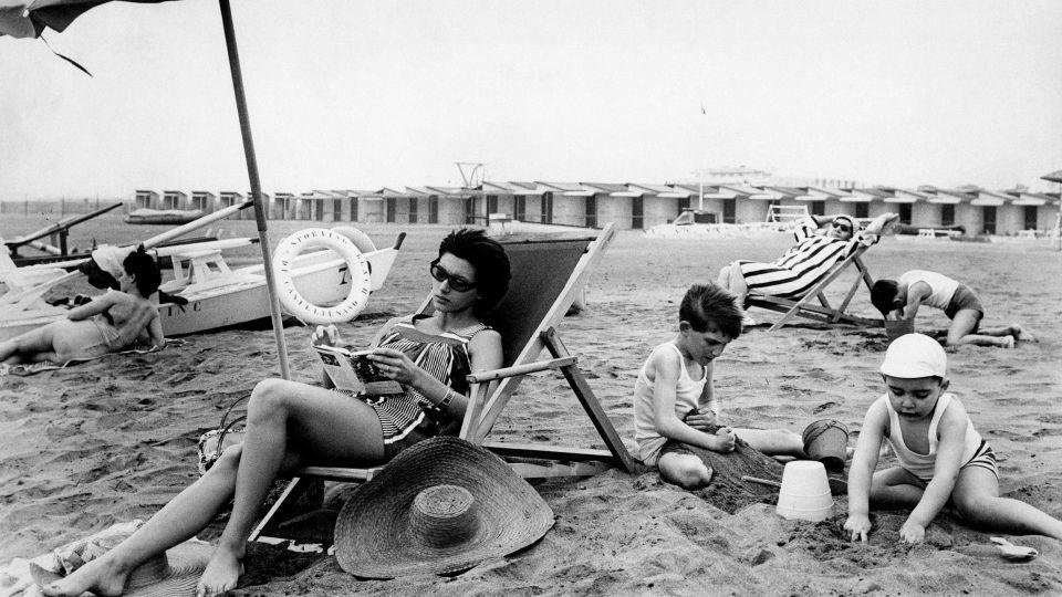 The association between summer and light reading came as summer travel became more accessible for the middle classes, according to scholar Donna Harrington-Lueker. - Mondadori Portfolio/Getty Images