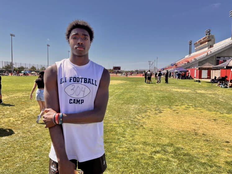 Aidan Chiles poses for a photo at the Long Beach Millikan passing tournament.