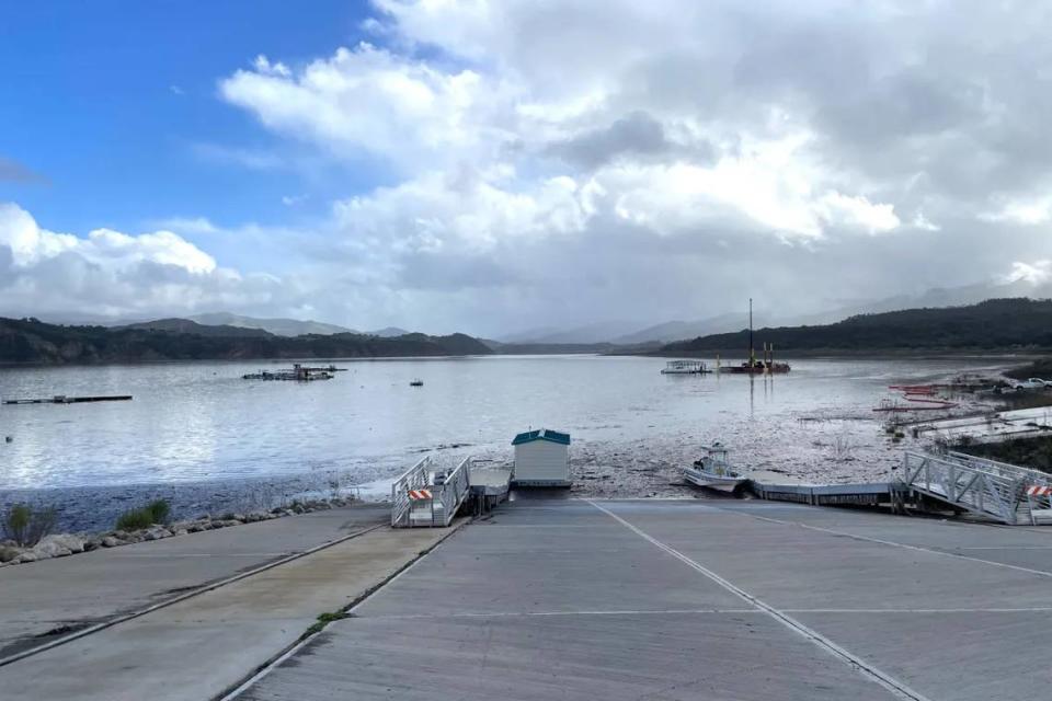 The boat launch at Lake Cachuma is nearly back in the water, and will be soon as the lake level continues to rise. Officials expect the lake to fill and spill by the weekend. Peter Hartmann/Noozhawk.com