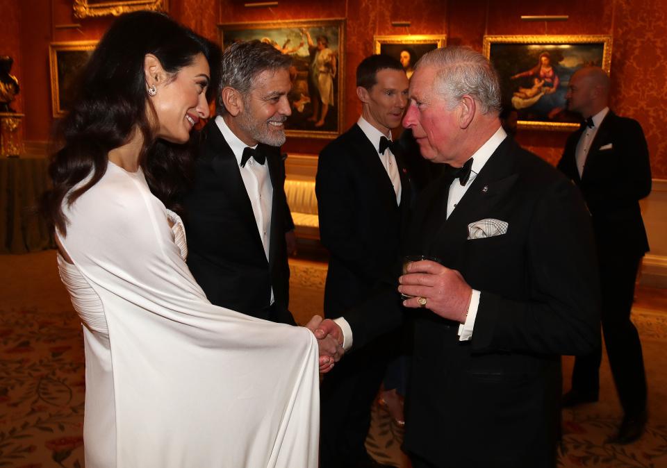 Amal and George Clooney joined Luke Evans, Chiwetel Ejiofor and Benedict Cumberbatch at Prince Charles' event in Wales.