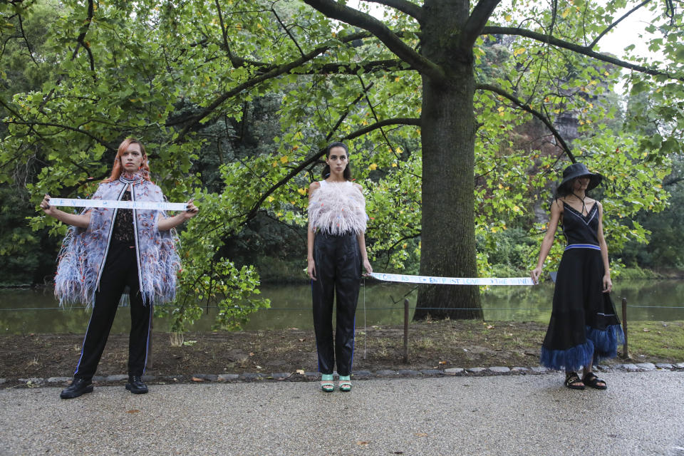 Models wear creations for the Koche Spring-Summer 2021 fashion collection, Tuesday, Sept. 29, 2020, during Paris fashion week. (Photo by Vianney Le Caer/Invision/AP)