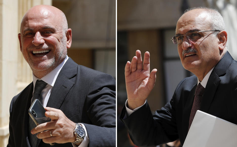 FILE - A combo picture shows Lebanese Public Works and Transportation Minister Youssef Fenianos entering parliament in Beirut, Lebanon, May 23, 2018, left, and Lebanese former Finance Minister Ali Hassan Khalil arriving at the parliament, in Beirut, Lebanon, July 16, 2019. Judicial officials say a judge at Lebanon’s highest court has suspended the arrest warrants against two former cabinet ministers in the case of the 2020 Beirut port blast. The Court of Cassation's judge lifted the warrants Tuesday against former ministers Youssef Fenianos and Ali Hassan Khalil. (AP Photo/Hussein Malla, File)