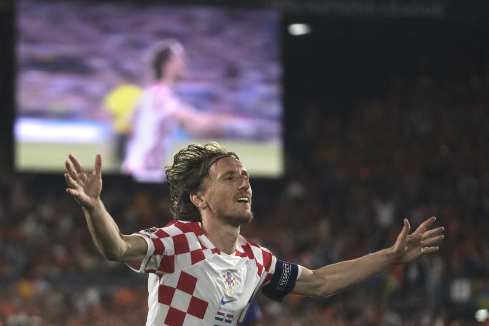 Croatia's Luka Modric celebrates after scoring his side's fourth goal against Netherlands during the Nations League semifinal soccer match between the Netherlands and Croatia at De Kuip stadium in Rotterdam, Netherlands, Wednesday, June 14, 2023. (AP Photo/Patrick Post)