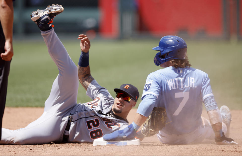 Kansas City Royals' Bobby Witt Jr. (7) steals second base as Detroit Tigers shortstop Javier Baez (28) is late with the tag during the sixth inning of a baseball game in Kansas City, Mo., Monday, July 11, 2022. (AP Photo/Colin E. Braley)