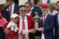 Jockey Sonny Leon (21) celebrates after winning the 148th running of the Kentucky Derby horse race at Churchill Downs Saturday, May 7, 2022, in Louisville, Ky. (AP Photo/Jeff Roberson)