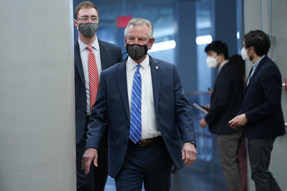 Sen. Tommy Tuberville, R-Ala., walks on Capitol Hill in Washington, Thursday, Feb. 11, 2021, before the start of the third day of the second impeachment trial of former President Donald Trump. (AP Photo/Susan Walsh)