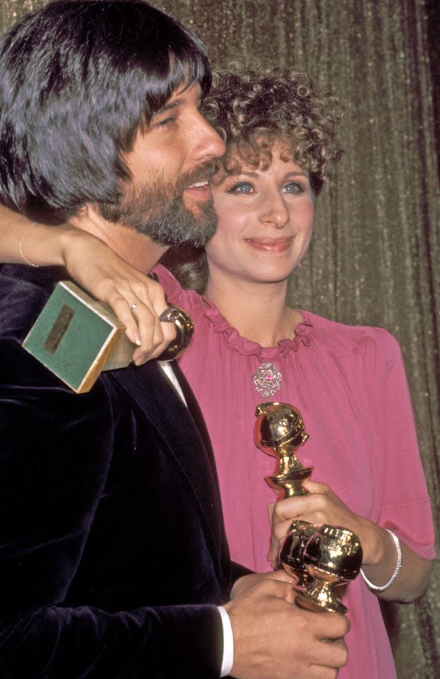 Jon Peters and Barbra Streisand at the 1975 <a href="https://parade.com/1304442/kaigreen/golden-globes-2022/" rel="nofollow noopener" target="_blank" data-ylk="slk:Golden Globes" class="link ">Golden Globes</a><p>Ron Galella/Ron Galella Collection via Getty Images</p>