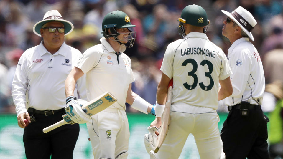 Steve Smith of Australia speaks to the umpire during day one of the Second Test match in the series between Australia and New Zealand. (Photo by Darrian Traynor/Getty Images)