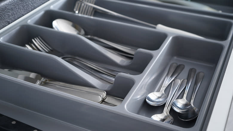 organized silverware in utensil tray
