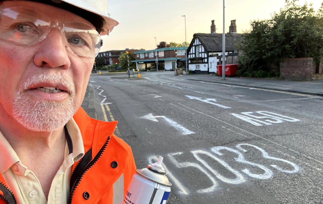 Peter Sharratt sprayed his own road markings onto a roundabout in Knutsford, Cheshire. (SWNS)